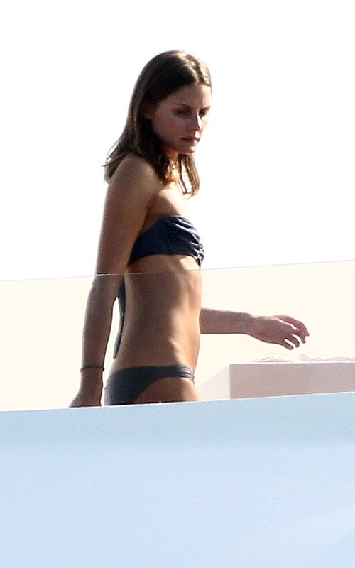 Ashley Greene - Black bikini candids on Valentino's yacht